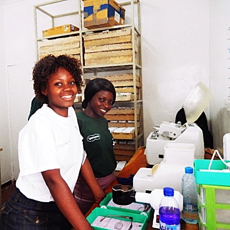 Precious and Modester at work in the glazing room