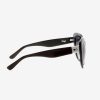 Side angle of cateye oversized ethical sunglasses in black
