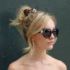 Woman wearing cateye oversized ethical sunglasses in black