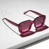 Berry Purple Pink coloured rectangle sunglasses with matching lenses. Made from eco friendly materials