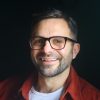 Man wearing bio-acetate square glasses in havana brown tortoiseshell.