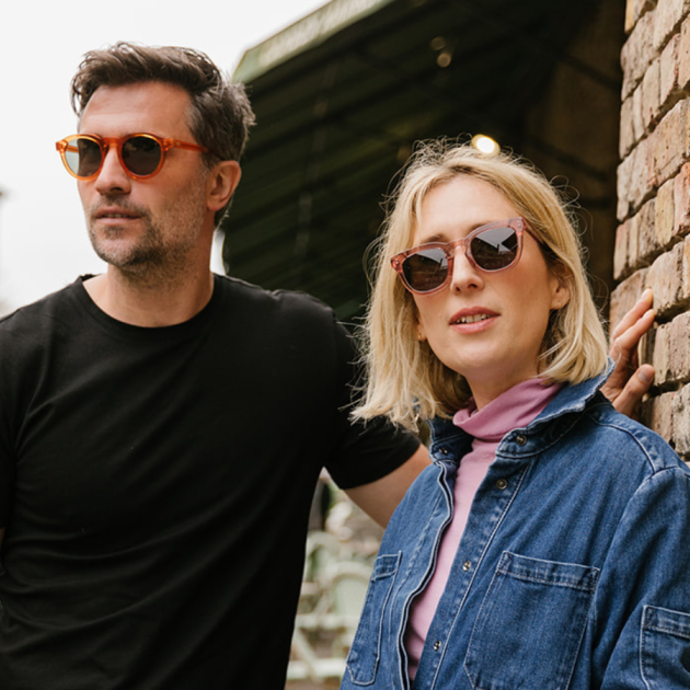 Man and woman wearing ec- friendly pala sunglasses in camden town.